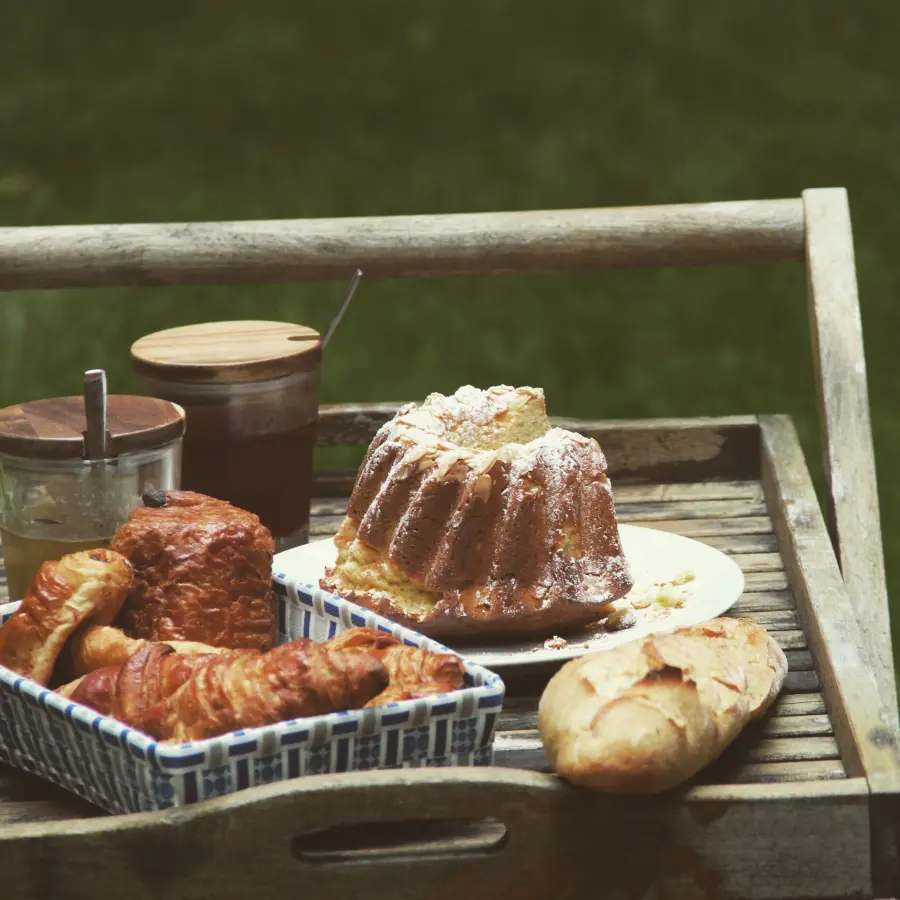 A breakfast tray: kouglof, pastries and bread